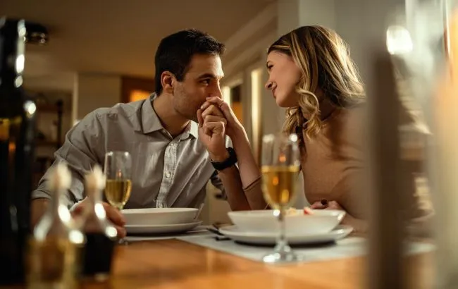 Happy black couple laughing, pationately in love, enjoying a romantic moment